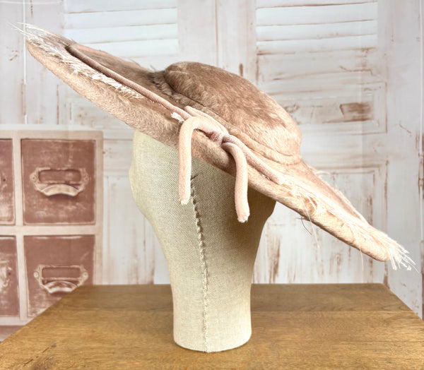 Huge Pale Pink Early 1950s Platter Hat With Feather Trim